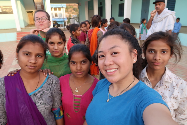 Kari, Rishi-Ji (in the back) and Olivia taking selfies with the girls.
