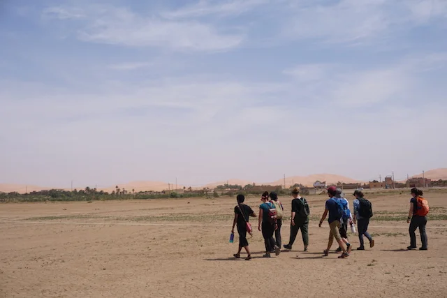 Walking to Merzouga, the desert town we stayed in.