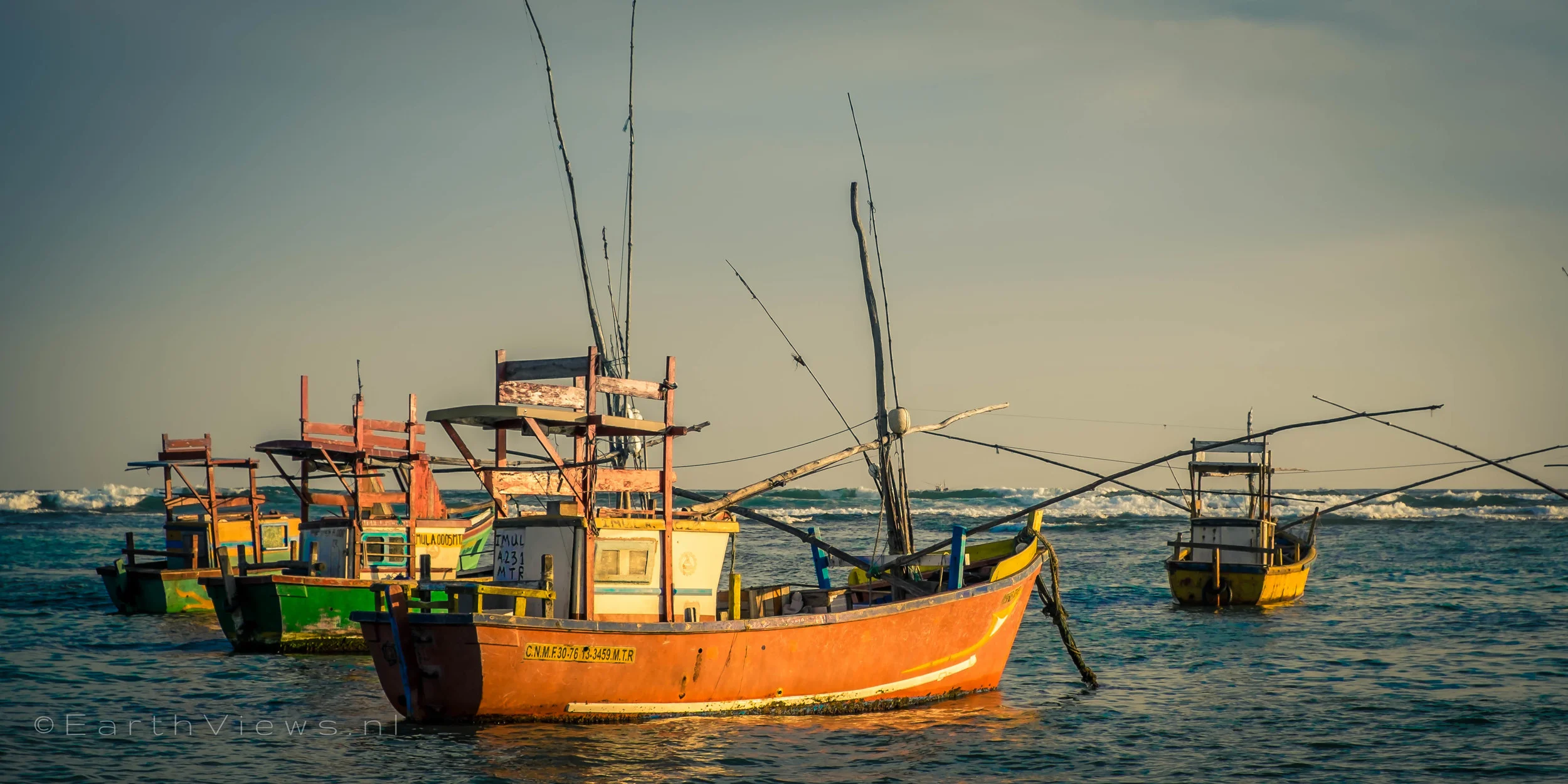 Boats lined up in the harbour of Weligama.