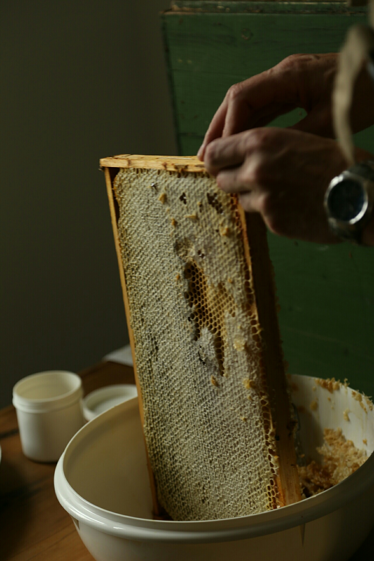 Taking propolis off the ends.