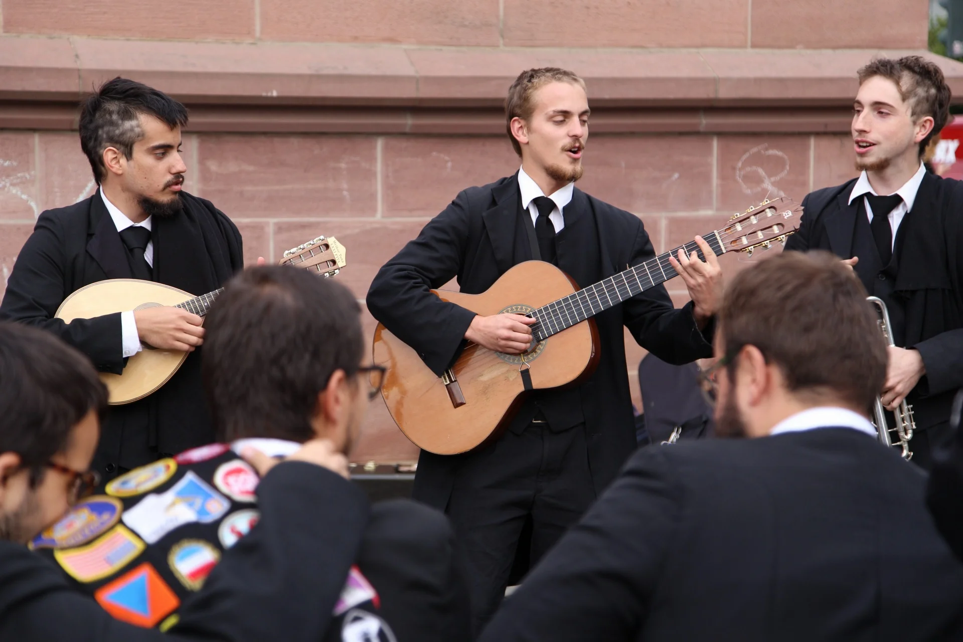 They were not singing to anyone but could've been making money as buskers