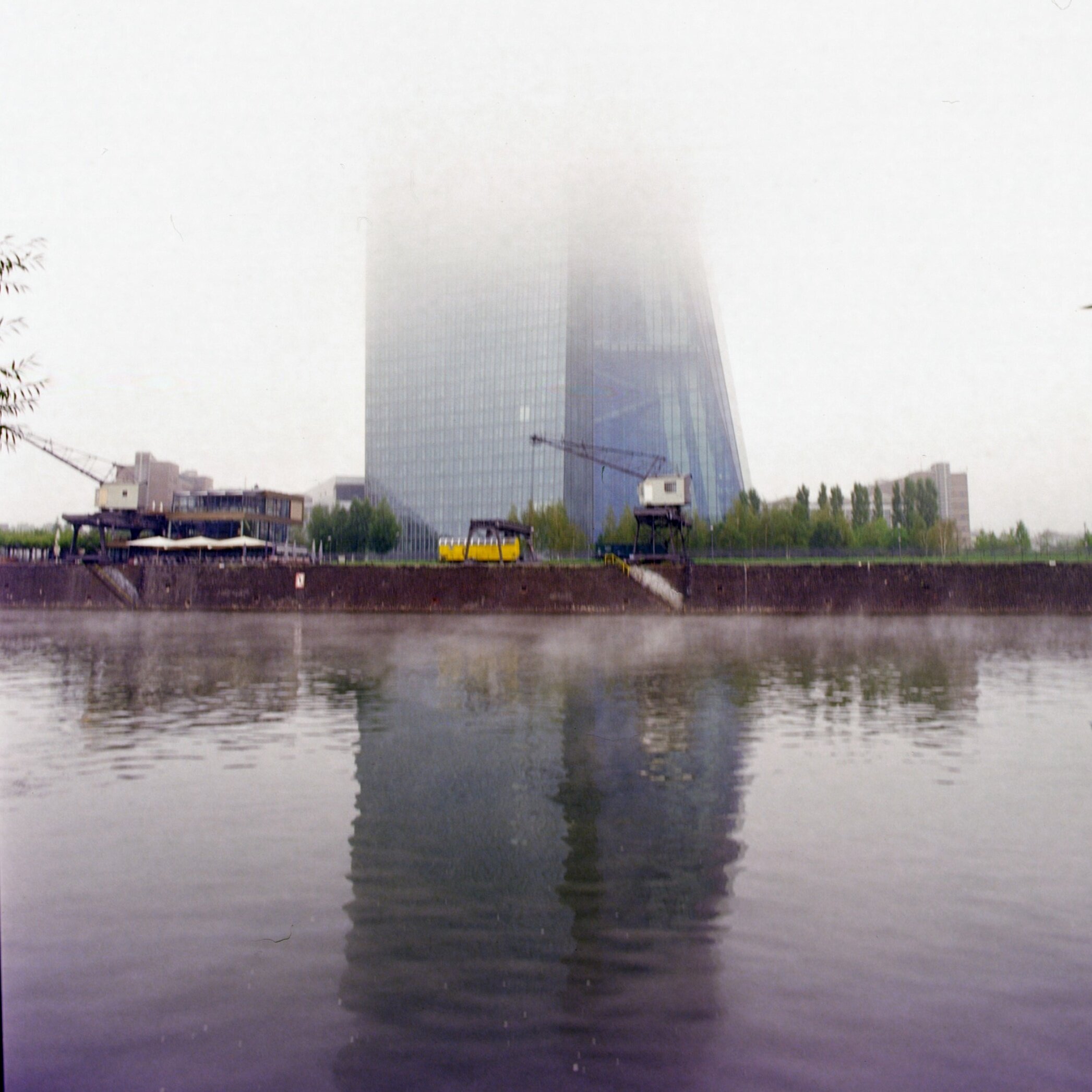 European Central Bank in fog. Slight magenta cast visible at the bottom.