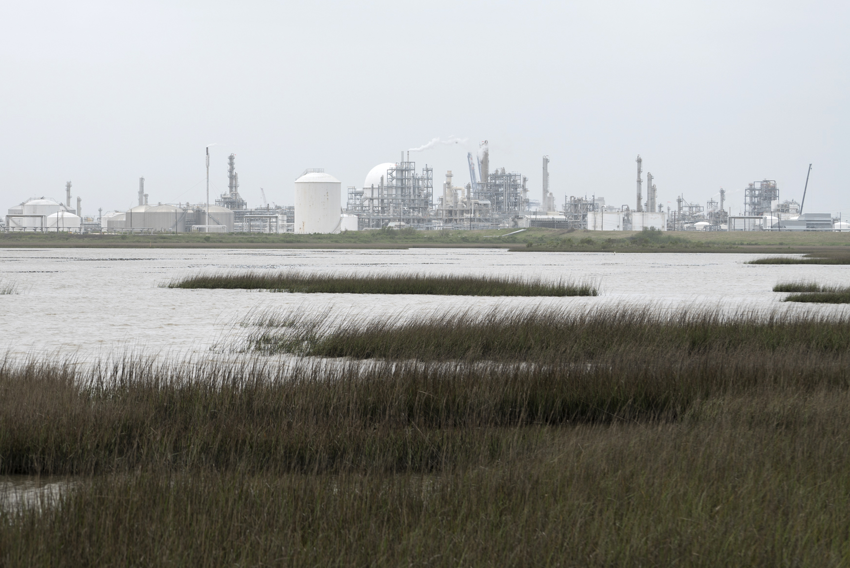 Dow Chemical plant and salt water marshes, Freeport, Texas.