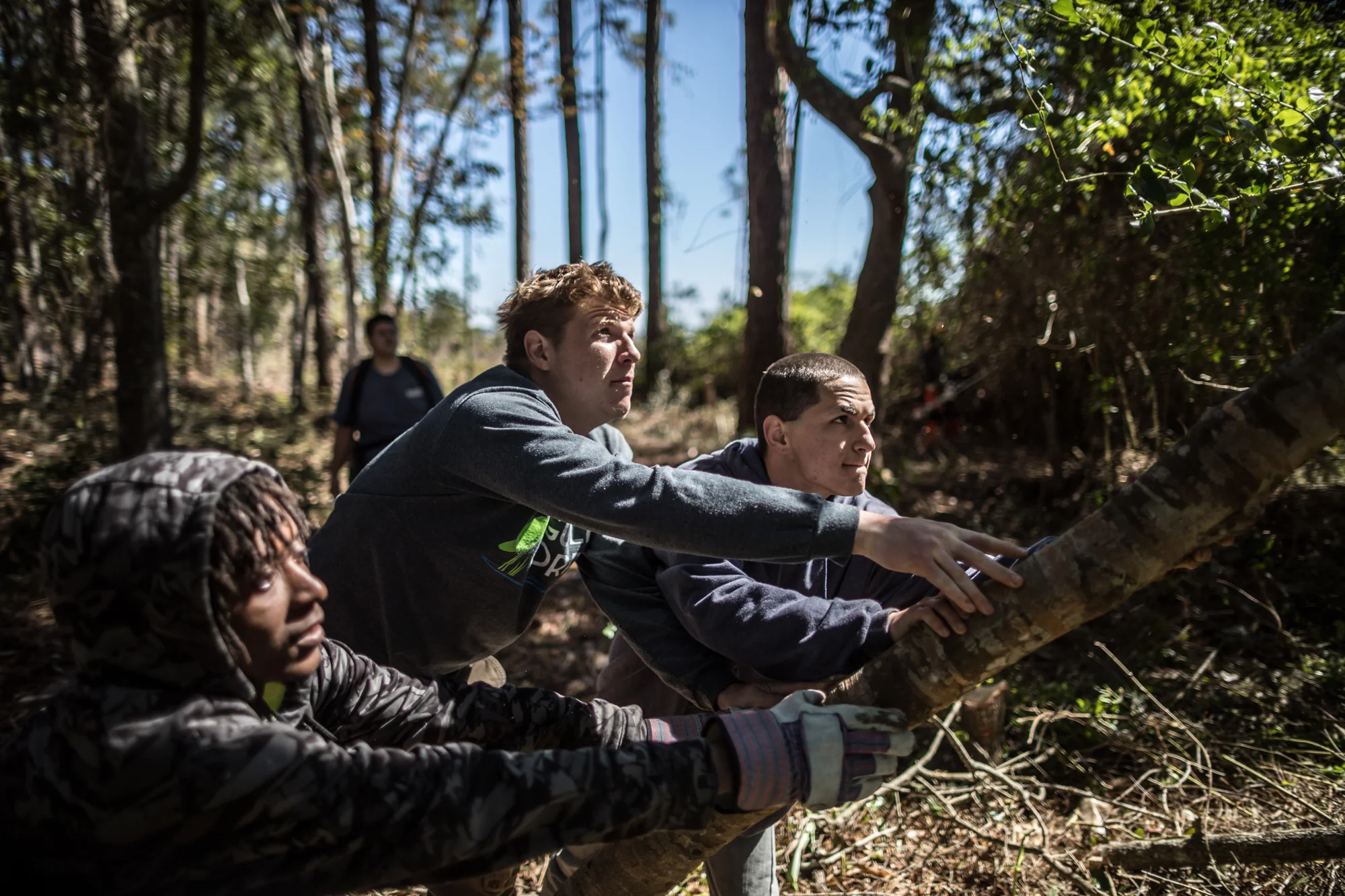 A GulfCorp team clears undergrowth on Florida’s “Forgotten Coast” near Apalachicola.