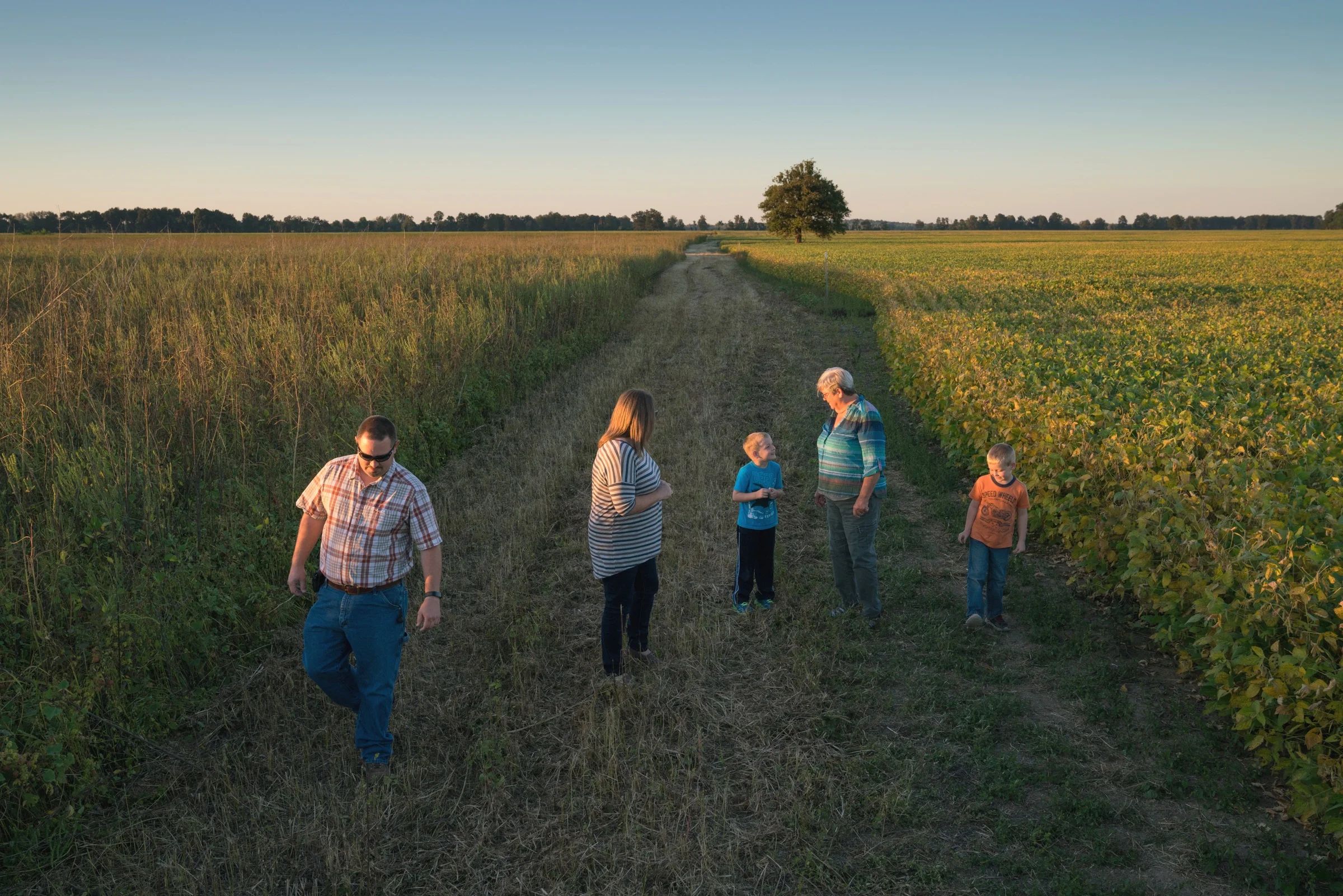 Kentucky farmer Judy Wilson, second from right, has put some of her Mississippi River bottomland in a conservation easement to restore trees and habitat for the central flyway.