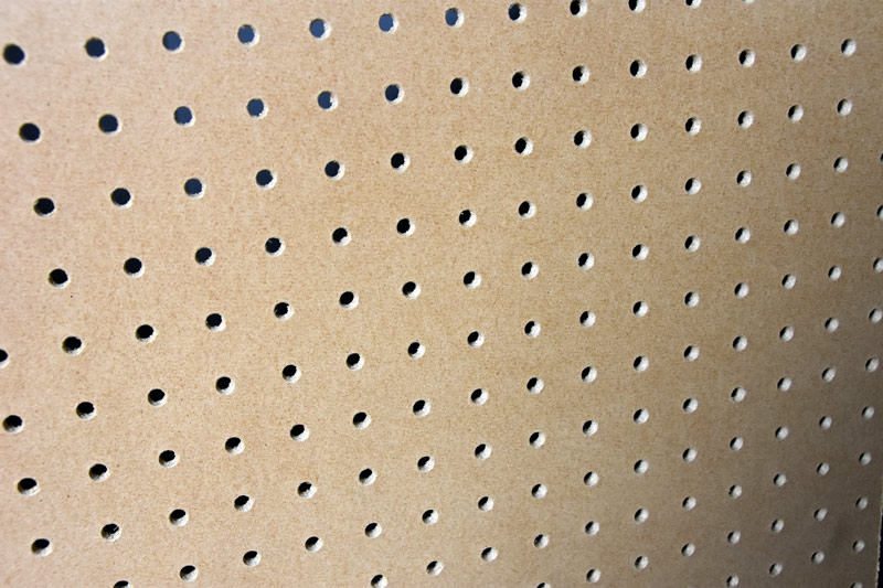 Pegboard-hole-acting-as-bass-traps.jpg