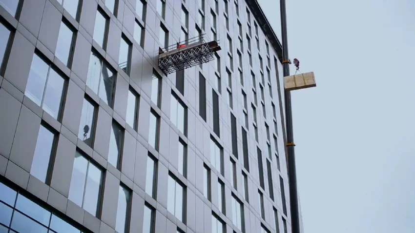 crane to deliver studio materials to the 7th floor