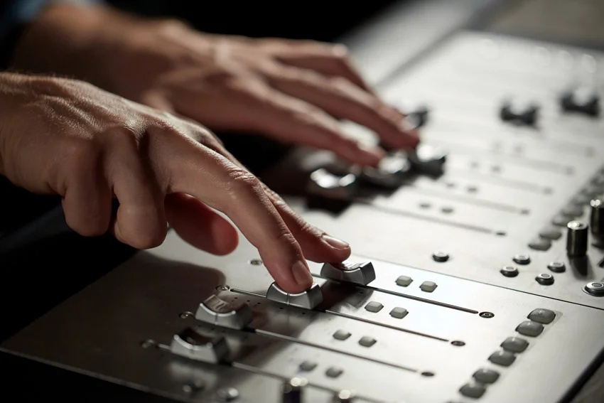 music-technology-hands-on-faders.jpg