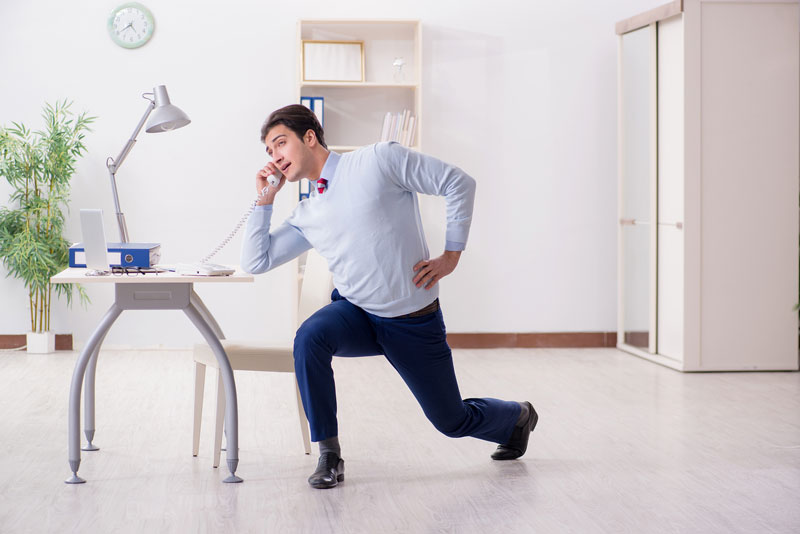 doing-stretching-exercises-at-the-desk-1.jpg