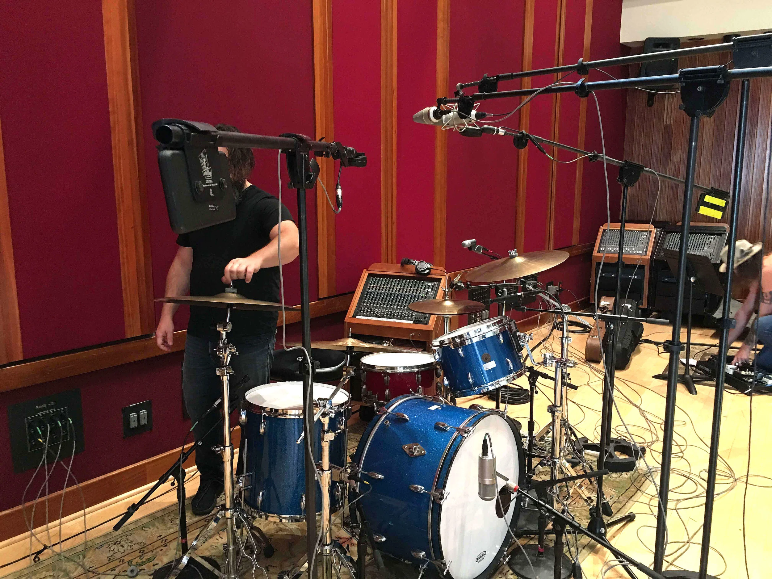 The kit was placed mid-room in Studio A at Blackbird. Drums sound excellent in this room no matter where you place them which is not the case in some large studios. In this case, it worked best for line of site to the other players.