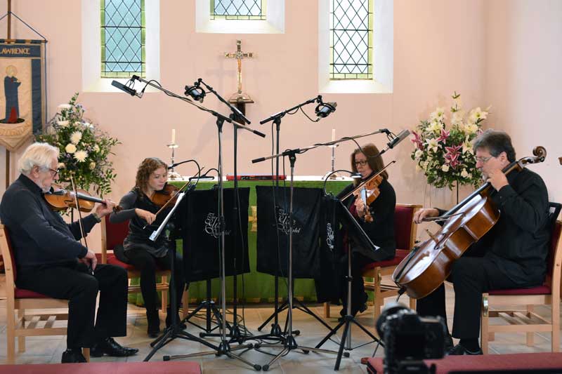 The full quartet being recorded using Sontronics ribbon microphones.