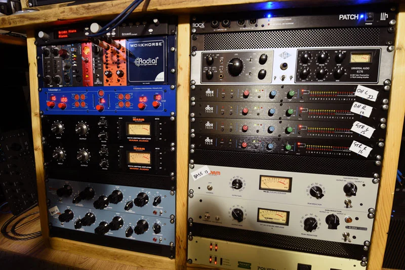 2x 16U studio outboard processing racks with 2x 6U I/O racks above them. All fully patched and tested