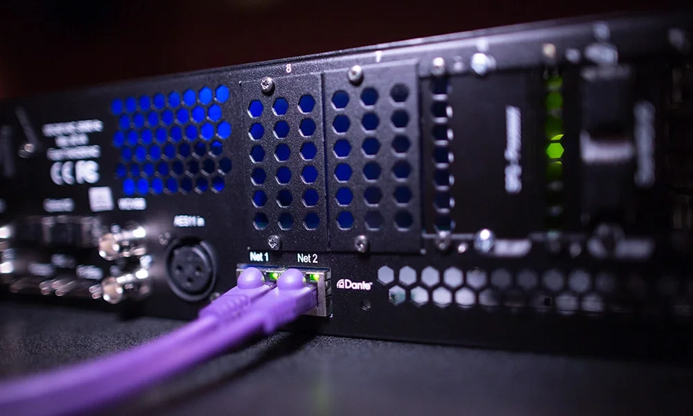 The rear of the Avid MTRX interface with 2 network cables connected.