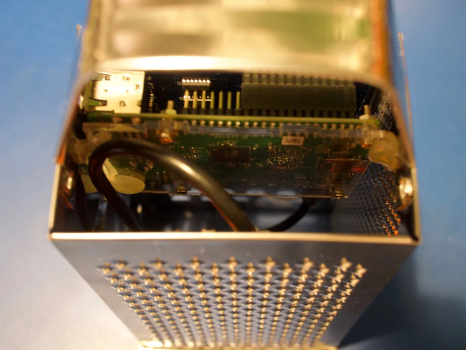 Raspberry Pi computer in a cheese grater tower