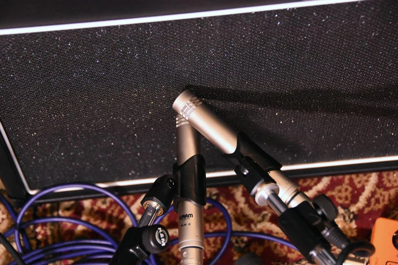 A very close 45 degree pair of Warm Audio WA-84 microphones on a single guitar speaker.