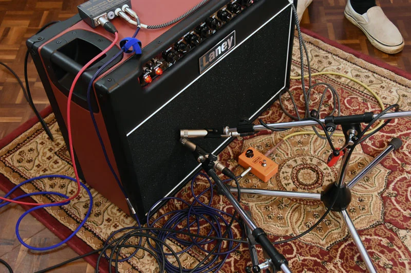 Pair of Warm Audio WA-84 Small Diaphragm Pencil Condenser Microphones on a guitar cab.