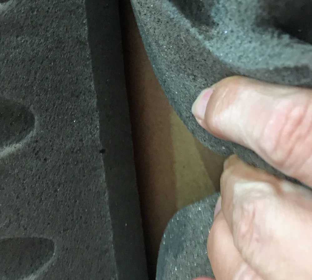 Acoustic Foam Tile pulled back to show panel absorber behind
