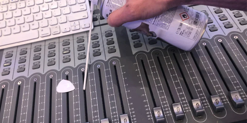 keeping-a-recording-studio-clean-from-dust-and-dirt-how-to-clean-sticky-control-surface-faders.jpg