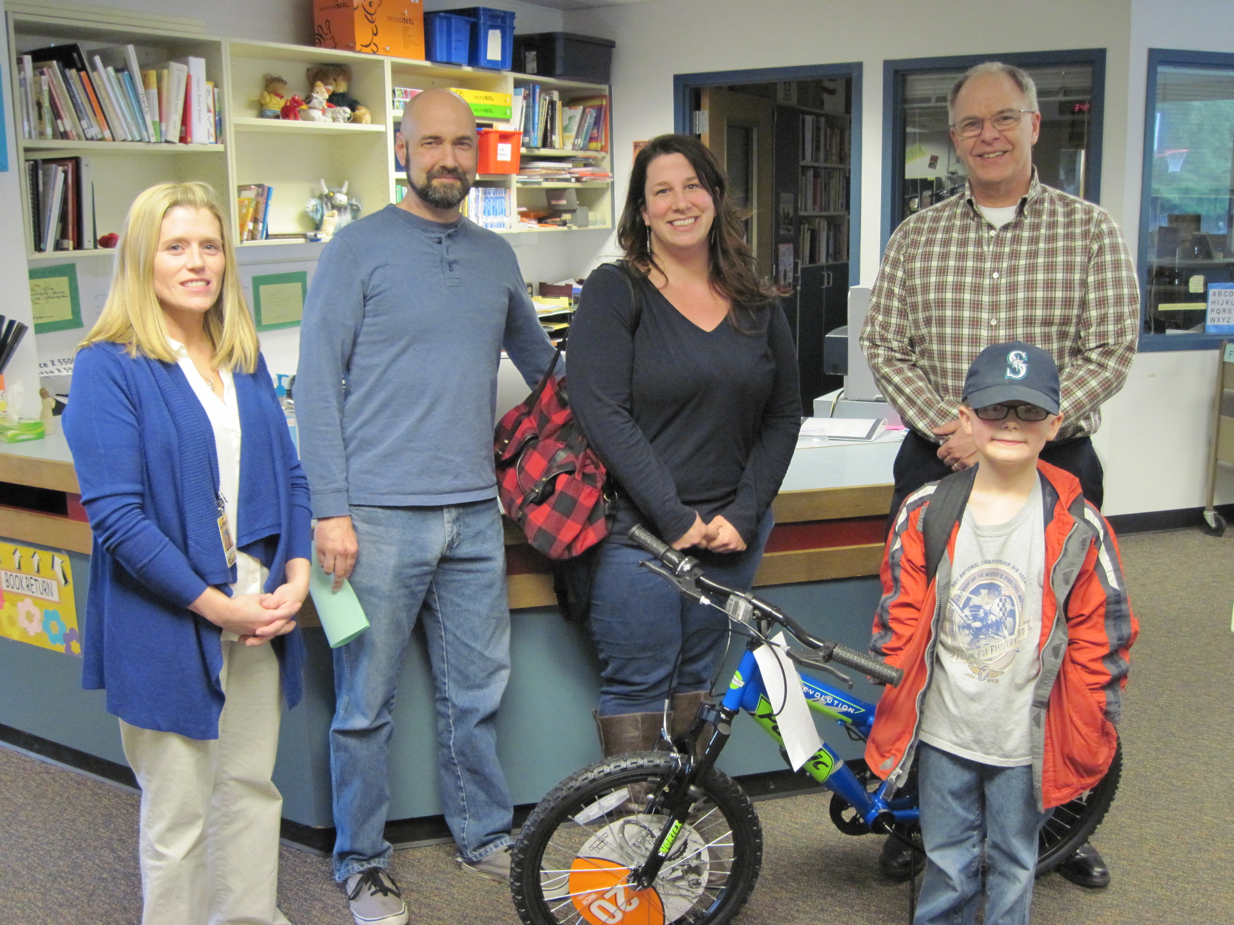 A Happy Reader Wins a Bike at West Hill El 2015.JPG