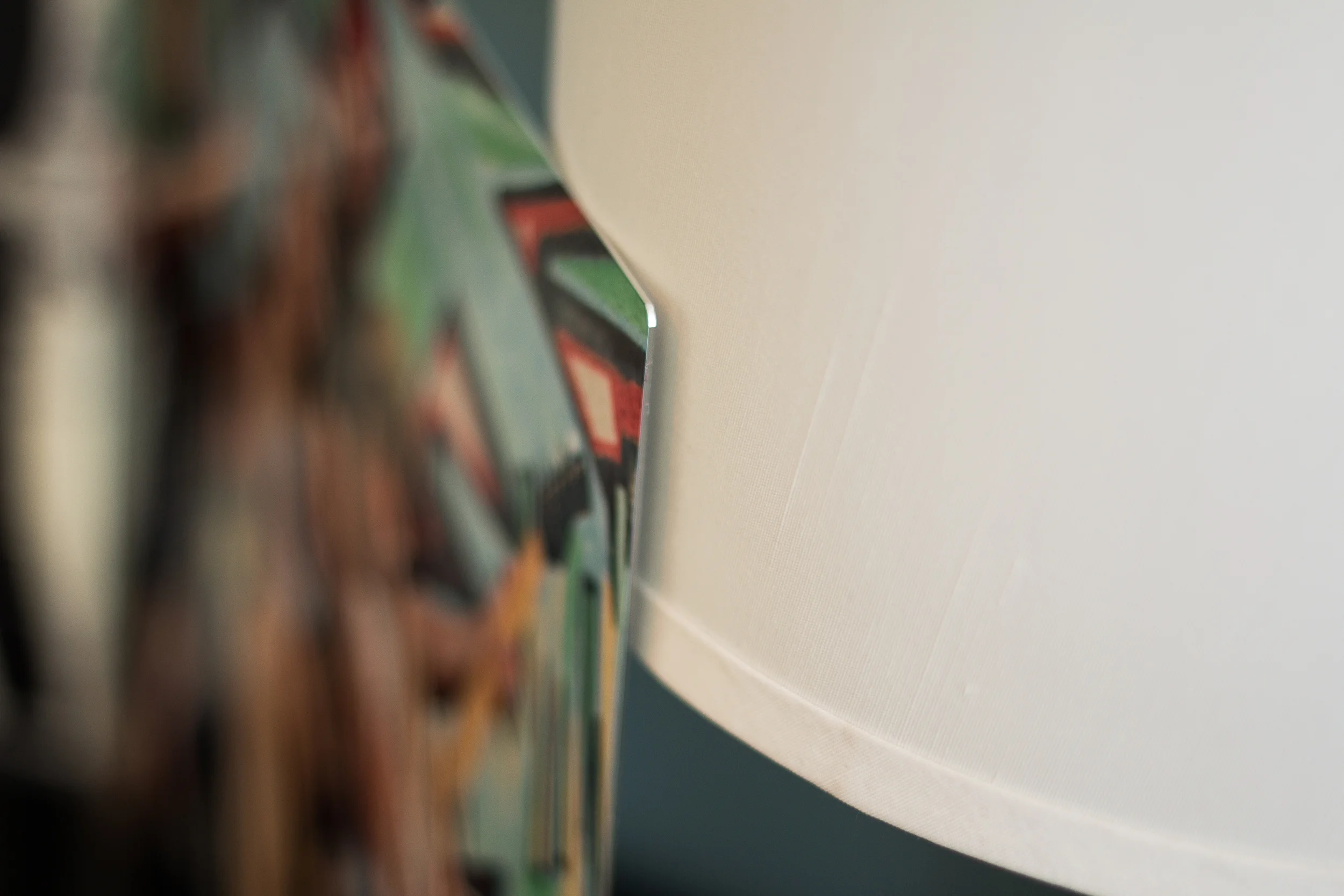 Mounted wall portrait print in modern interior.