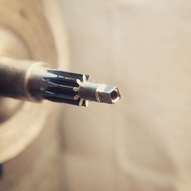 A new cannon pinion in progress for an 18th century verge fusee pocket watch. The minute hand frictions onto and is indexed by the square milled at the top, and is long enough to accommodate a square key required to set the time. Harkens back to an a