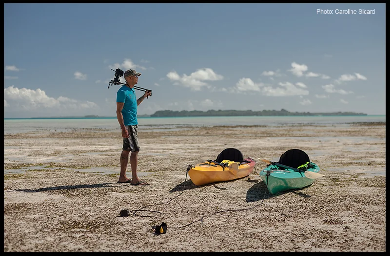 Scoping out the scenery on a remote uninhabited island in Palau, Micronesia with slider over the shoulder.