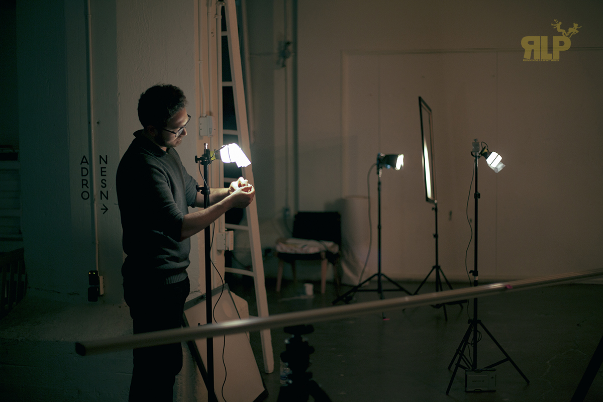 Key Grip, René Arseneau, adding diffusion on Goal Zero's Light-A-Life to add fill lights for the talent.