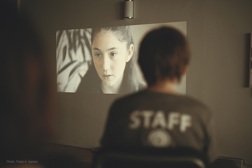 Stella Altamirano-Lovejoy watches Romy T. Fima's monologe.