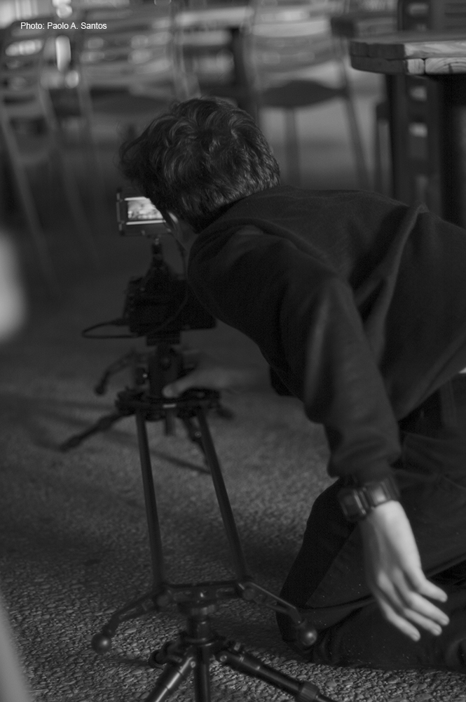 Oliver Woodall shooting with a Canon 5DM2 monitoring through SmallHD's DP4 and running it on Rhino Camera Gear's slider on Redged Tripods.
