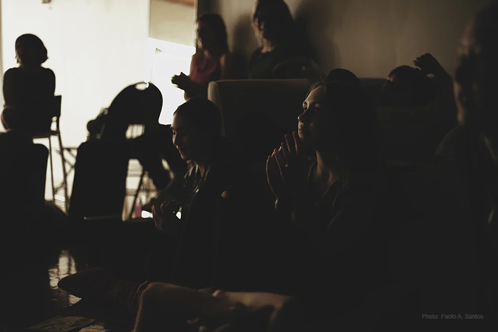 Samantha Treville watching her monologue "The Plug".