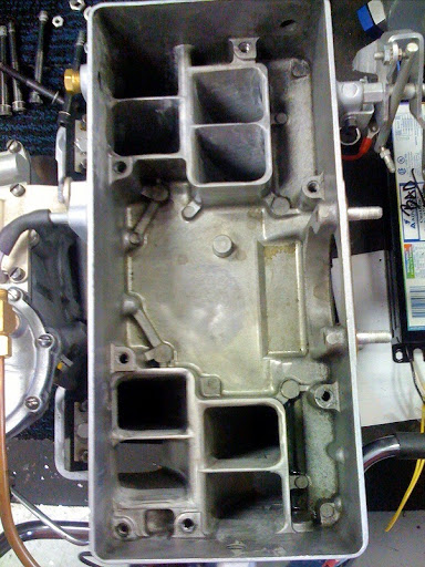 Ported air runners inside Rochester Fuel injection air box.jpg