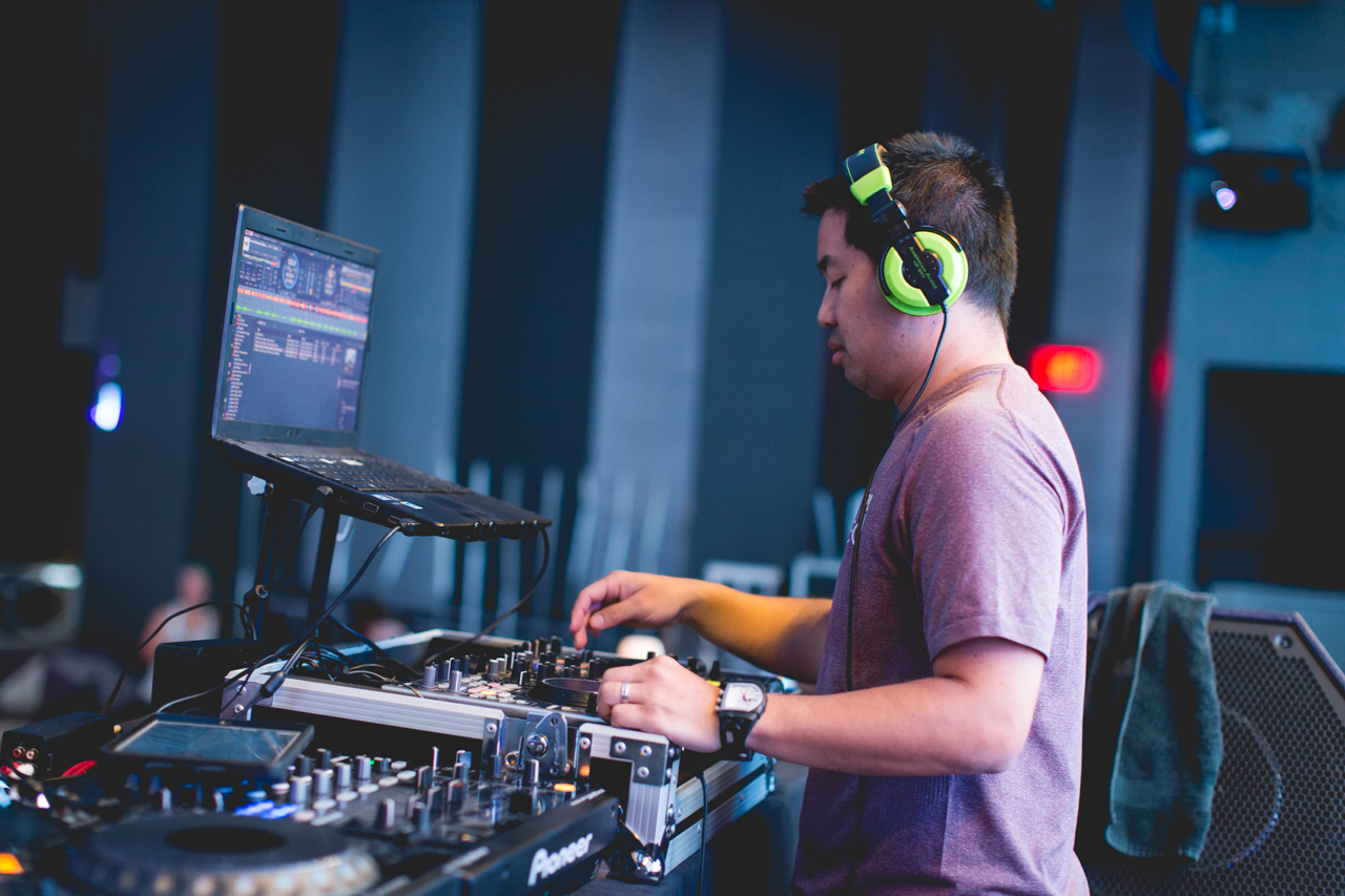   San Diego DJ, Justin Kanoya, plays music for a yoga session at Parq San Diego.&nbsp;  