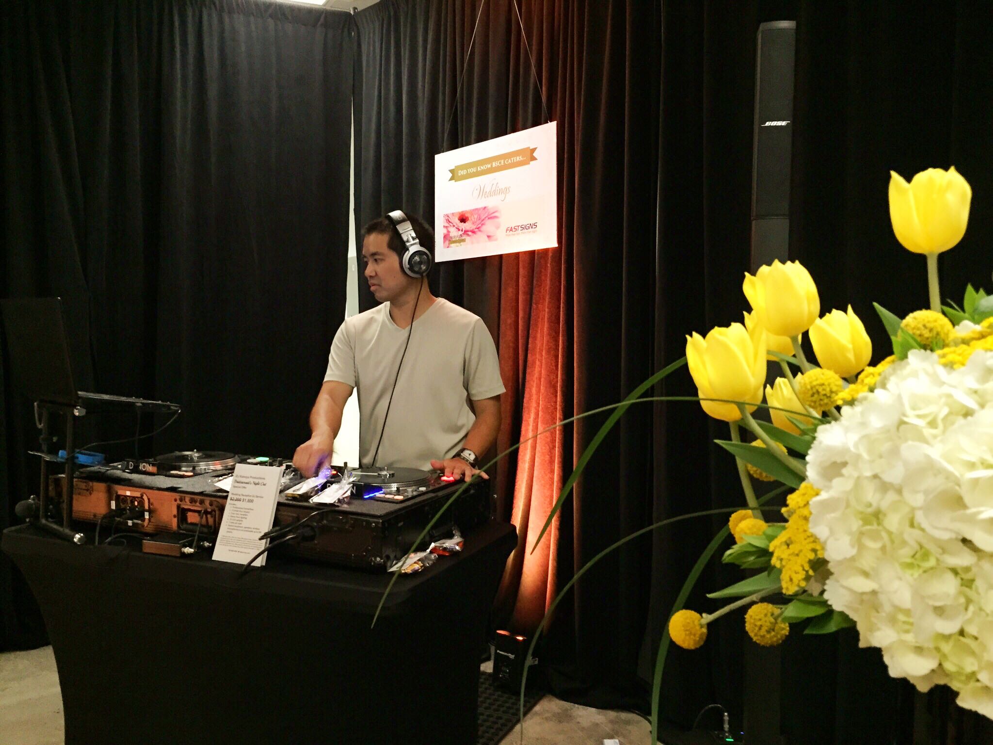 DJ Justin Kanoya provides live DJ service at the Brothers Signature Catering and Events grand opening party in San Diego, California. 