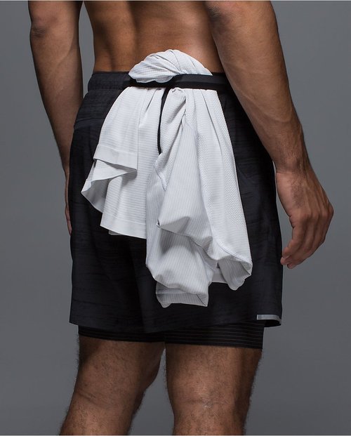 Take off your shirt and tuck it in the specially-designed waistband loop.