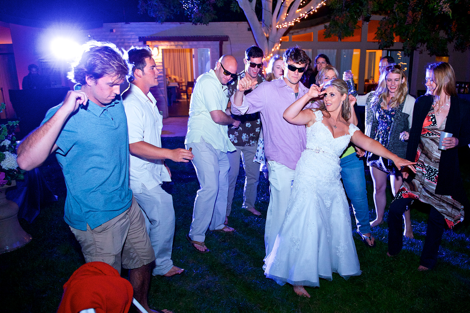   Megan and Trevor dance with friends and family at their Paradise Point wedding in San Diego.&nbsp;  
