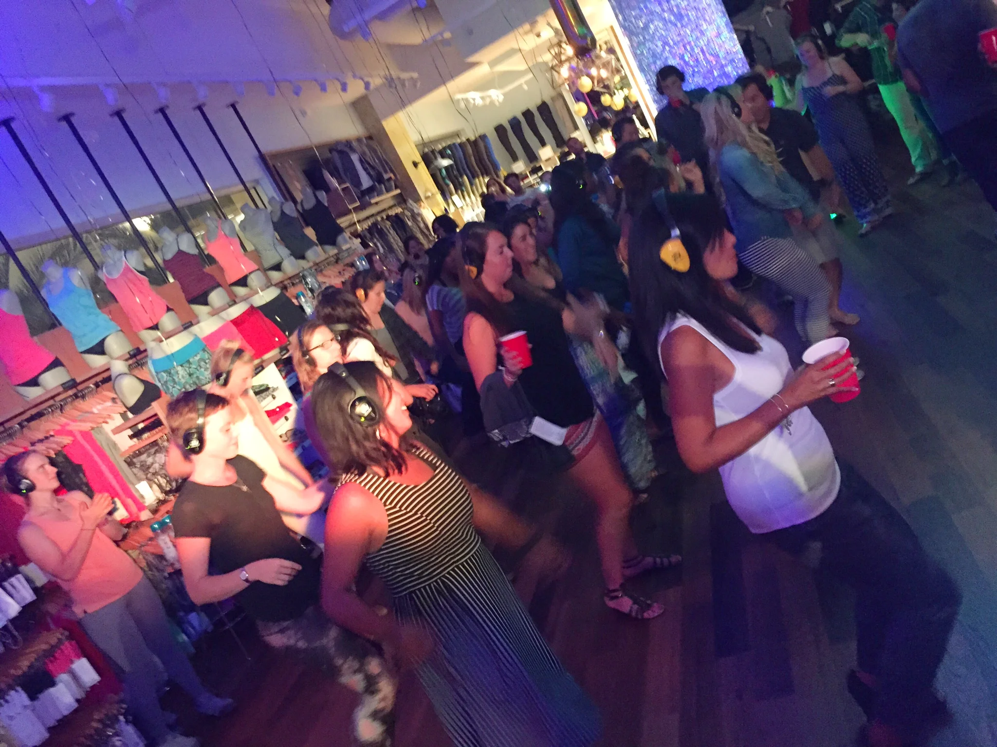 The dancing is normal, the listening to music though your own individual headphones is not. This is a silent disco. 