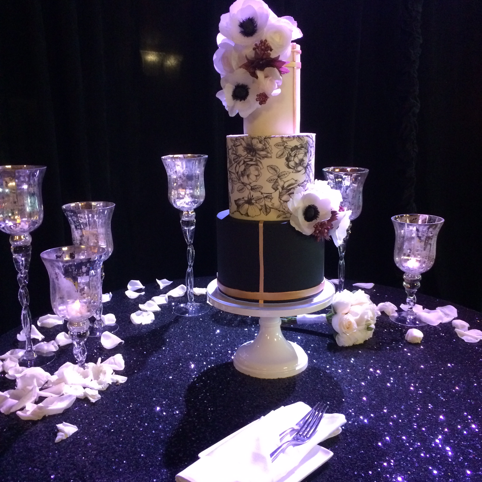  A wedding cake with a spotlight nicely illuminates this focal point of every wedding reception.&nbsp;  