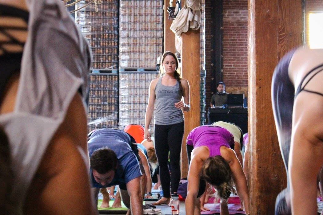 Lauren Padula leads a yoga session to benefit the Movember Foundation. 