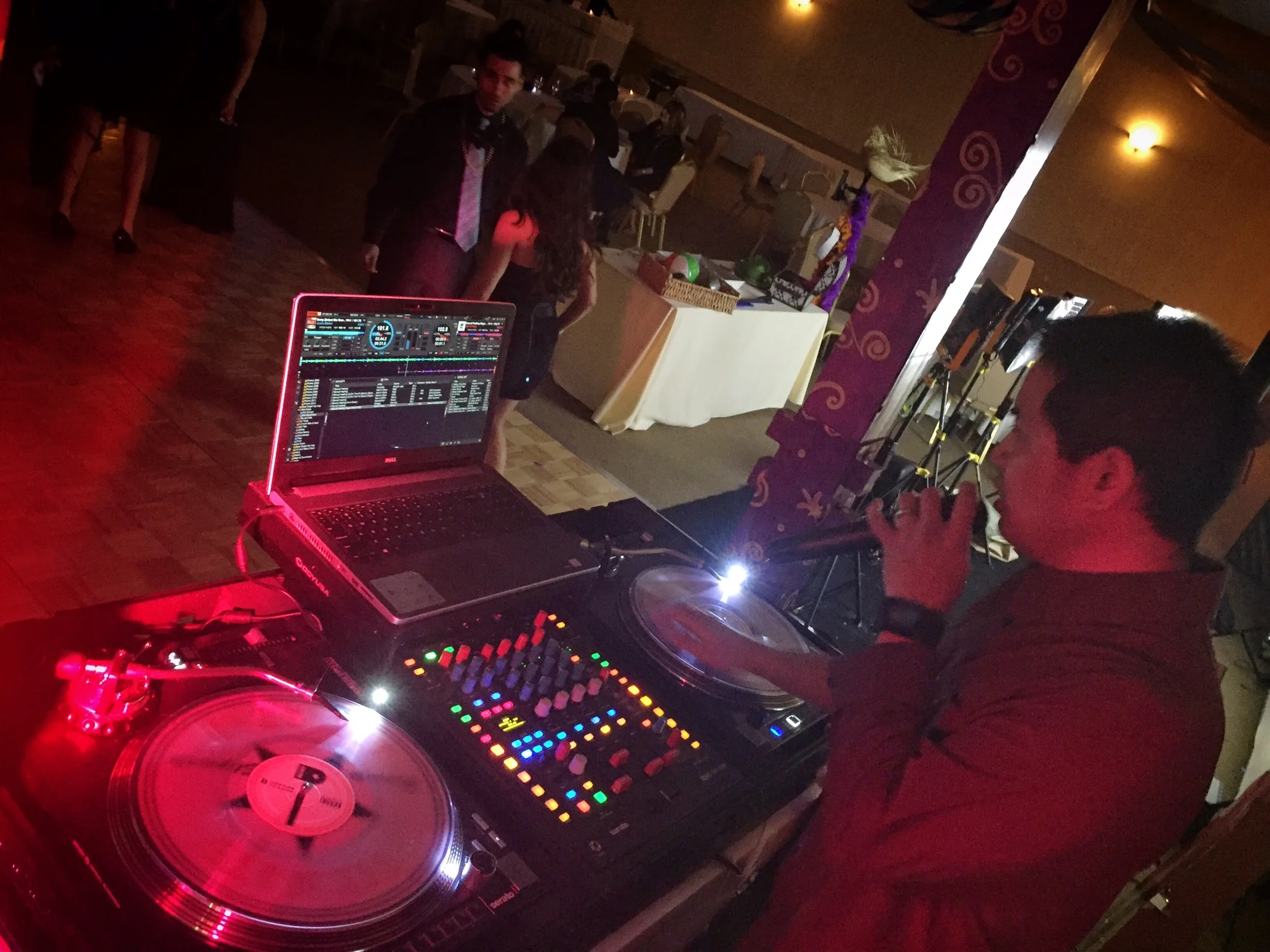 DJ Justin Kanoya MC's the Pacific Marine Credit Union Holiday Party at South Coast Winery.