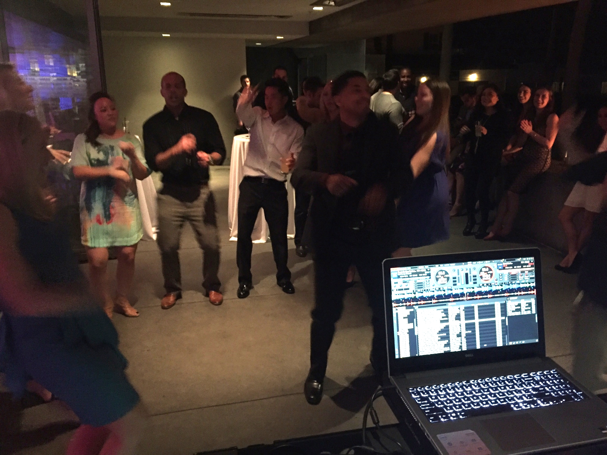   Proven Recruiting employees and their guests dance to the beat of DJ Justin Kanoya.&nbsp;  