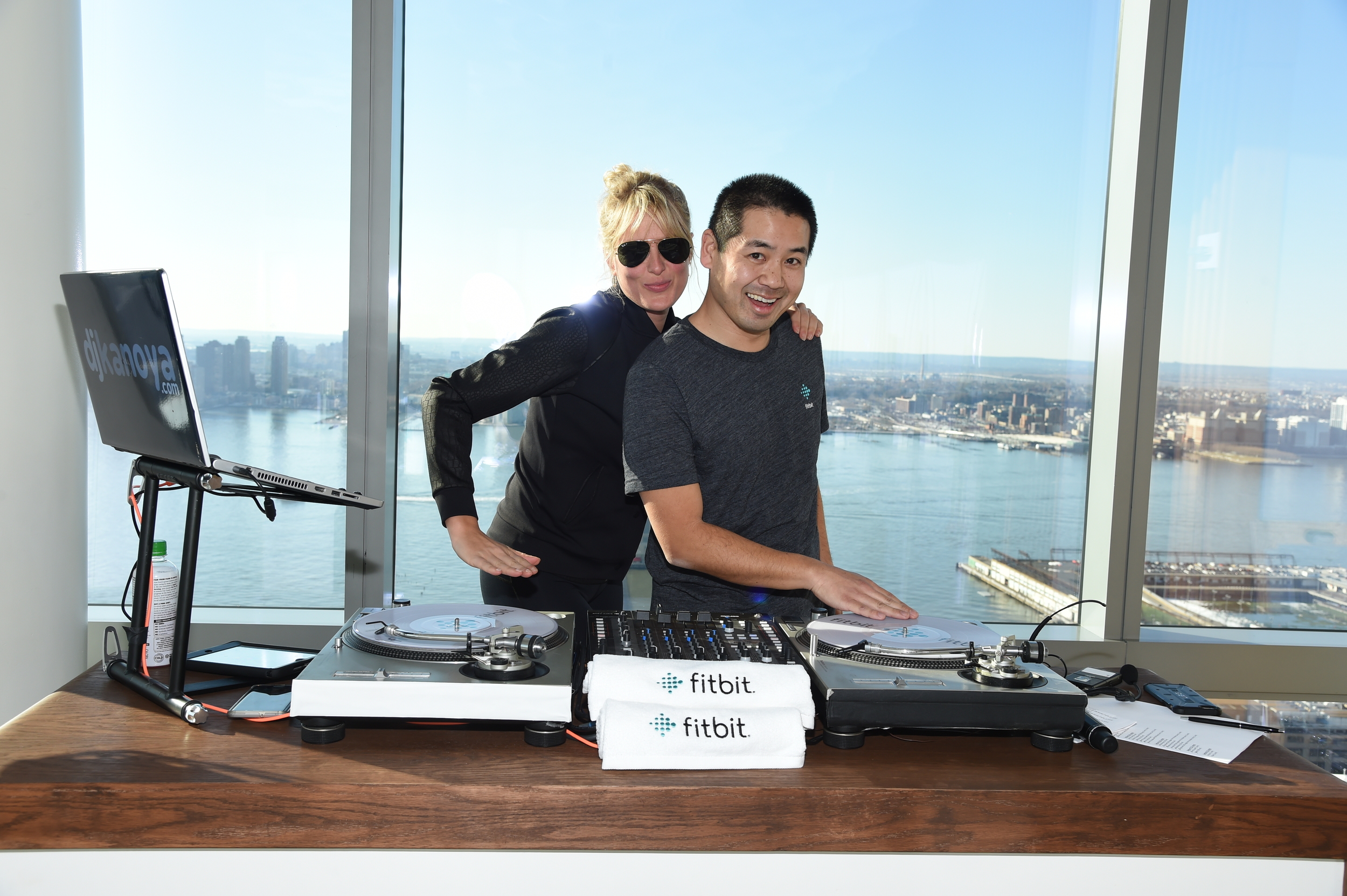   Celebrity stylist, Anita Patrickson, in the DJ booth with San Diego DJ, Justin Kanoya.  