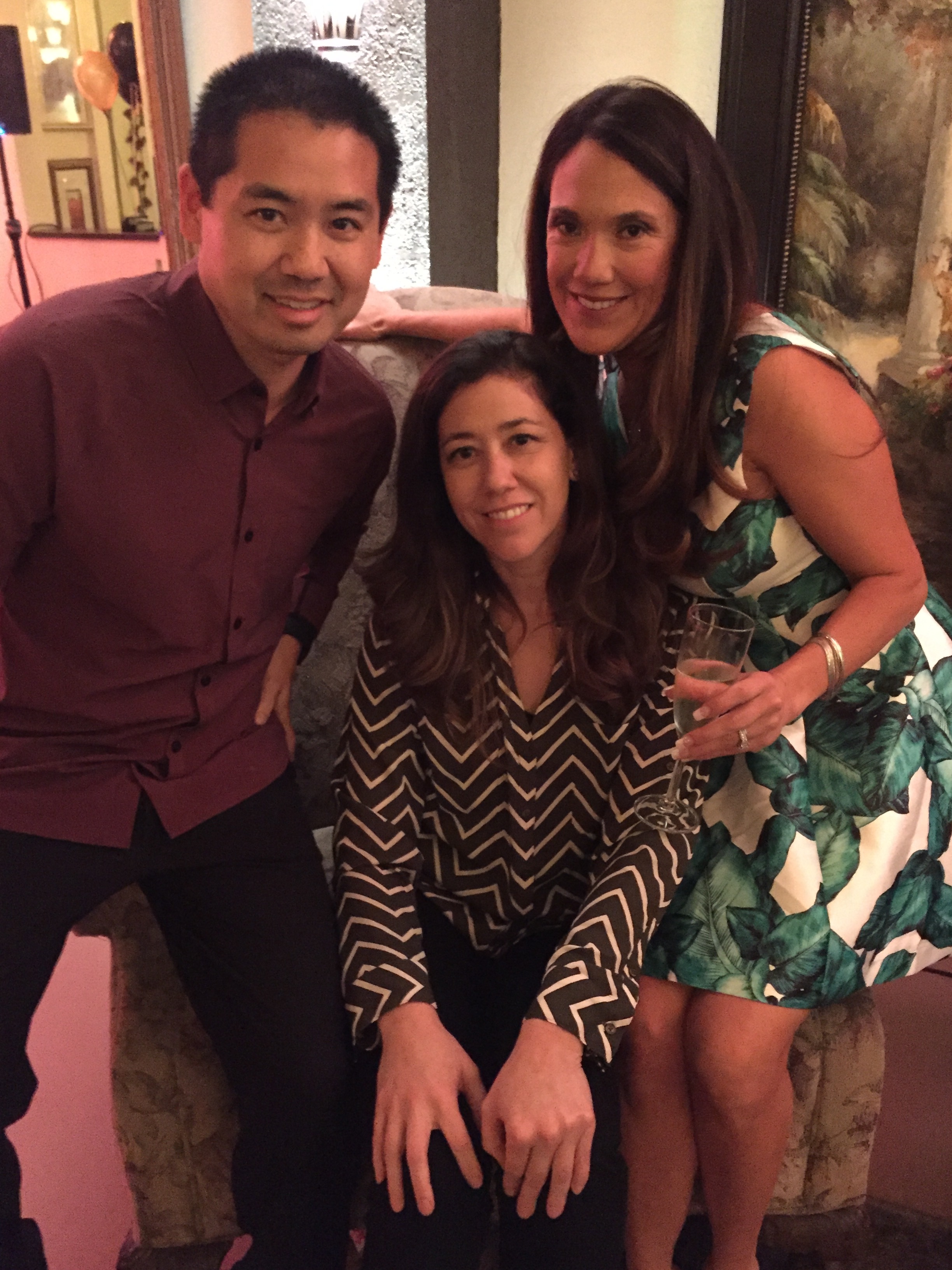 San Diego, Justin Kanoya, with party host Felicia (right) and her sister, Allison (middle).