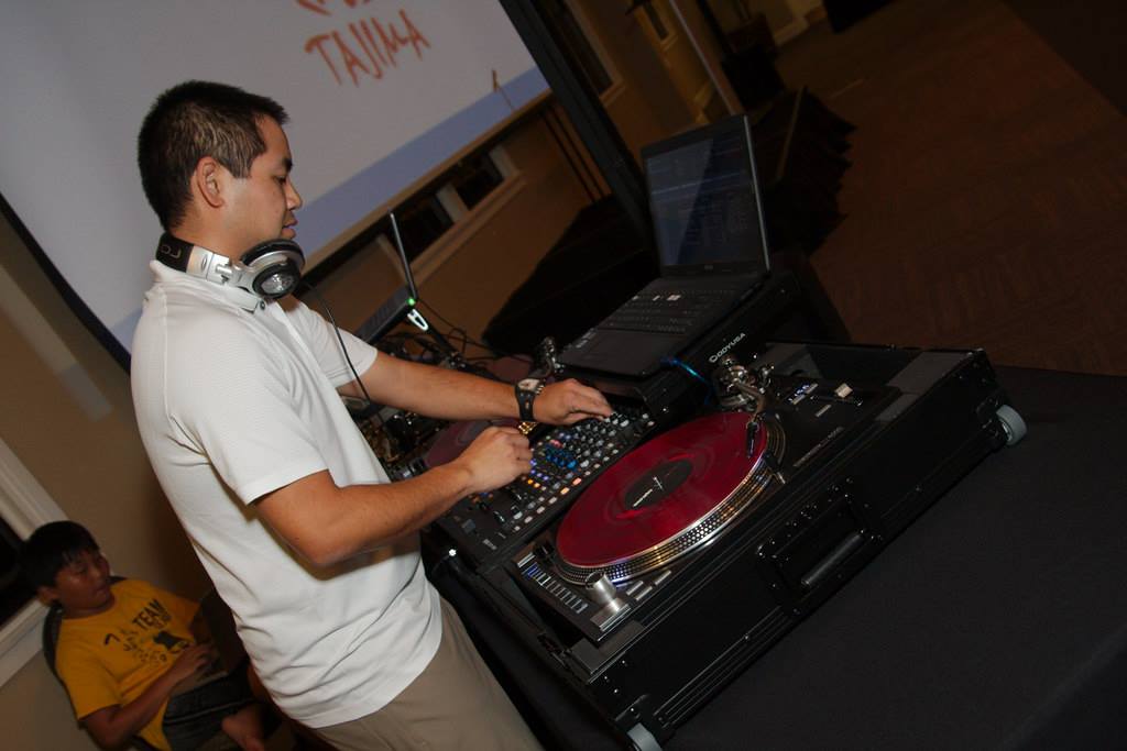 San Diego DJ Justin Kanoya spins tunes at Chew the Scene, the kick off event for the 2015 San Diego Asian Film Festival.