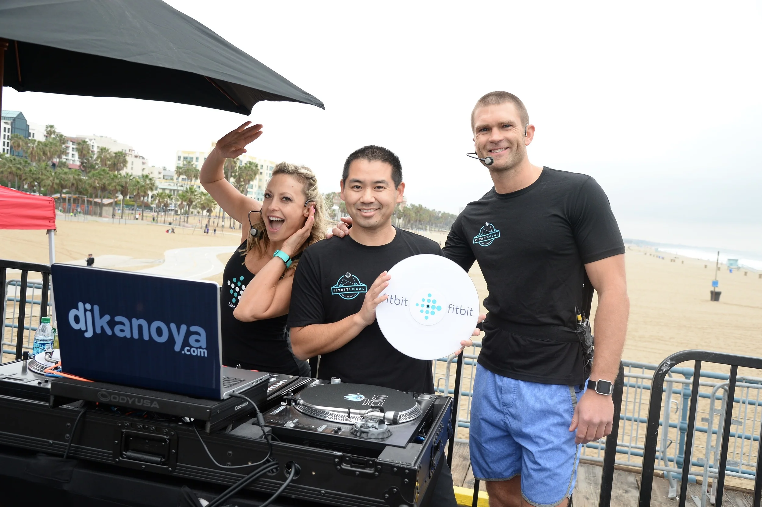DJ Justin Kanoya provides the beats for the Fitbit Local event in Santa Monica.