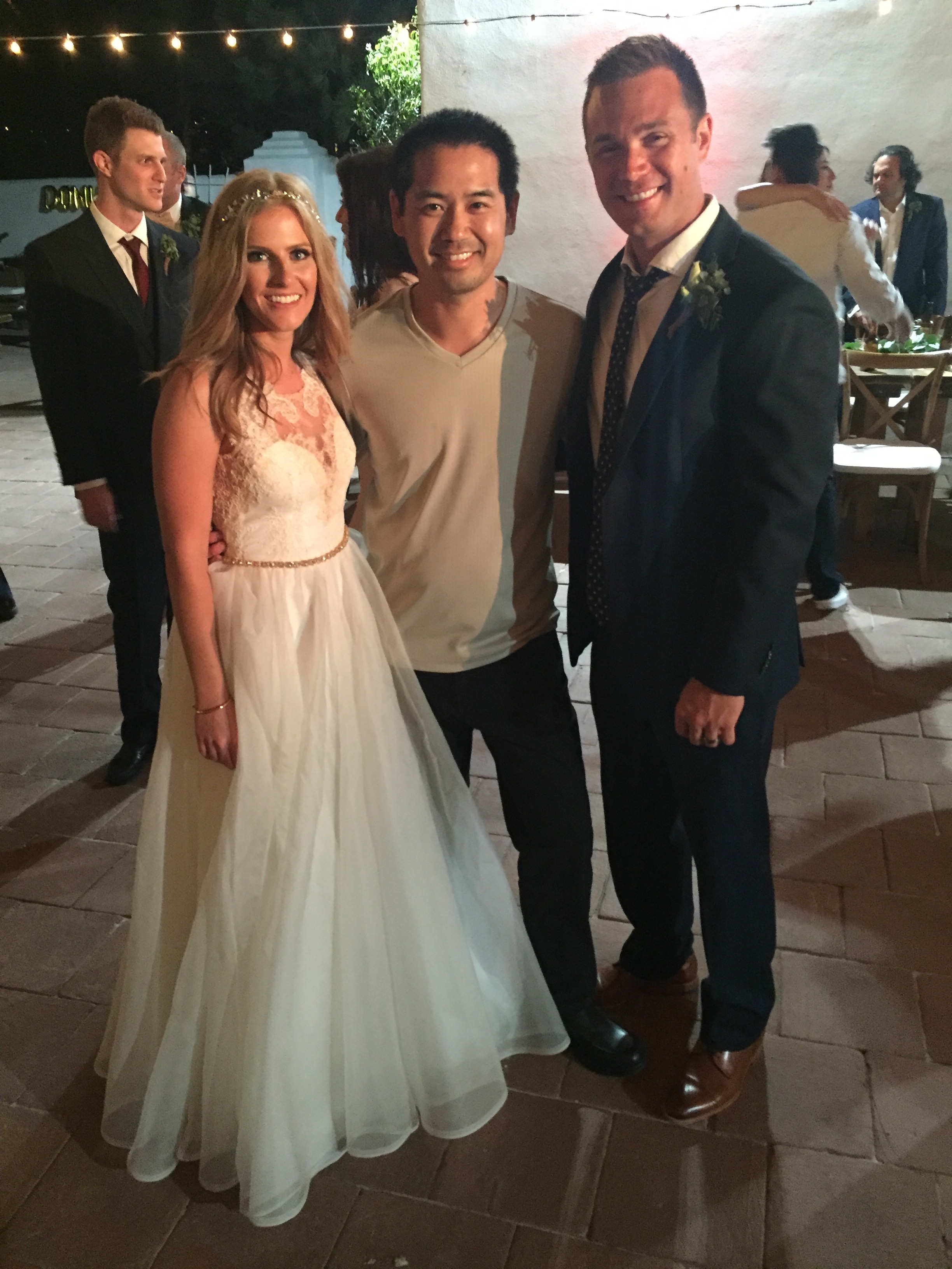 San Diego DJ Justin Kanoya with the bride and groom, Ashley and Chad, after their wedding at the Historic Cottage