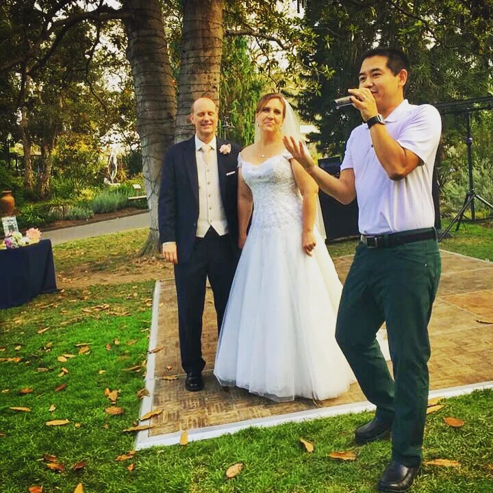 San Diego Wedding DJ, Justin Kanoya, introduces the newly wedded couple, Joy and Doug , at the San Diego Botanic Garden. 