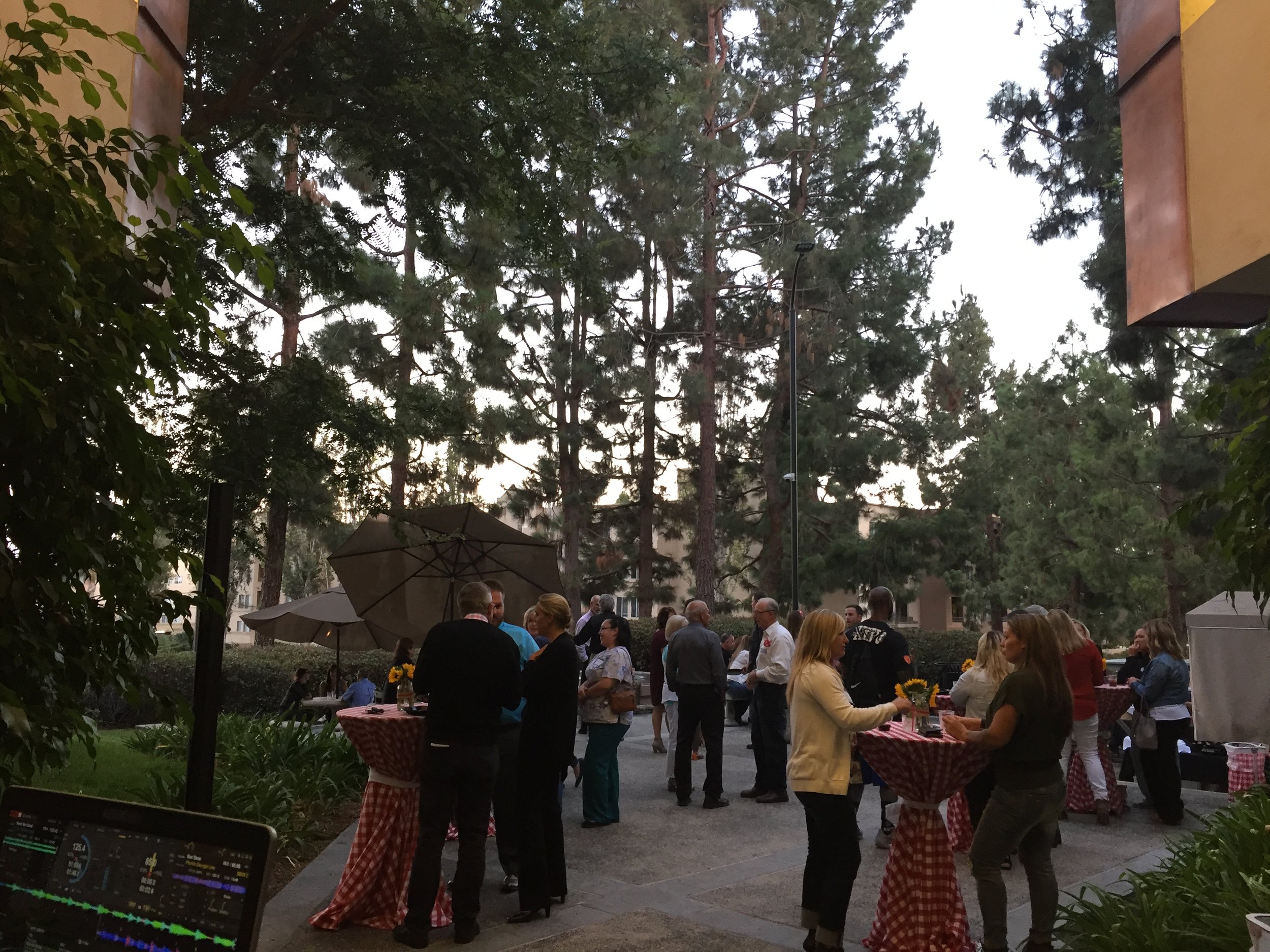   Employees and guests of Torrey Pines Periodontal &amp; Implant Center celebrate their second anniversary.  