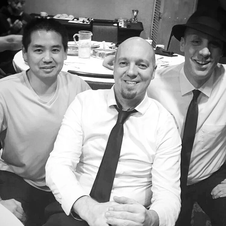 DJ Justin Kanoya with members of Pop Vinyl, Brian Hogan and Aaron Erlichmann