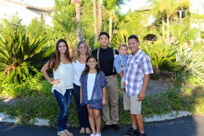 The Abrenica Family from left: Alyssa, Christina, Italia (front), Elijah, Lawrence (holding Kaden).