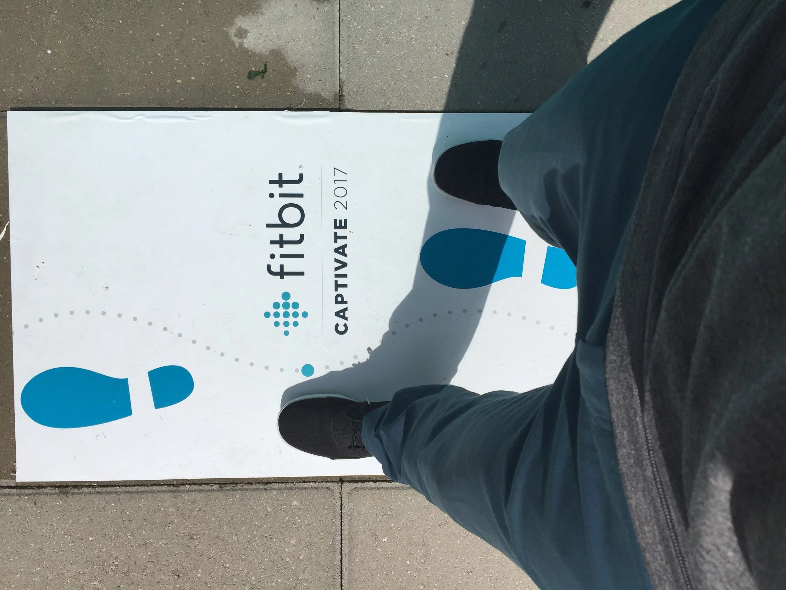 Fitness event DJ, Justin Kanoya, walks into the Fitbit Captivate 2017 Conference